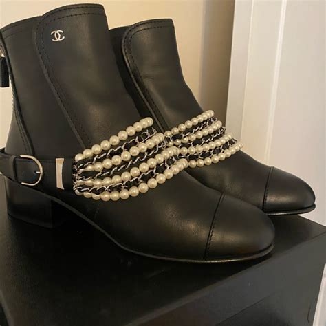 women chanel boots leather black|chanel boots with pearl heel.